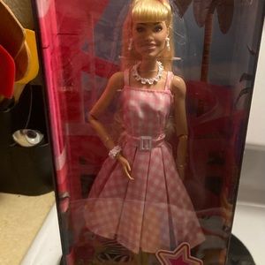 Barbie doll and Barbie through the decades sticker book! Beautiful set!